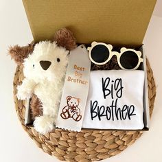 New baby? Don't forget their big brother. Perfect little gift to send to the new sibling to let them know you are thinking of them. Gift box included ❤️Big brother shirt Adorable font, one of our favorites!  Thread color is navy blue Sizes 2T, 3T, 4T, 5T ❤️Little stuffed puppy or bear.  ❤️Sunglasses with teddy ears. ❤️ Award Ribbon Best big brother award ribbon. FOLDED NOTE CARD If gift message is requested, we will include a handwriting font printed note card with the gift. Please make sure your message was saved and include who the gift is from. If you are not sure if the message was saved during checkout, send us a message and we will make sure we received it. Packing and Shipping Your order will be delivered by USPS. Please contact us if you need this item in a hurry and we can upgrade Gifts For New Big Brother, New Big Brother Gift Ideas, Big Brother Kit, Upgraded To Big Brother, Big Brother Gifts, Big Brother Shirt Embroidered, Award Ribbon, Big Brother Shirt, New Sibling