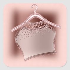 a pink background with a hanger and water droplets on the top, as well as an image of a white shirt