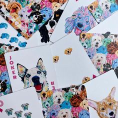 many different colored dogs stickers on top of each other with the same dog's face