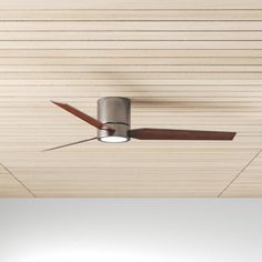 a ceiling fan mounted to the side of a wooden ceiling in a room with white walls