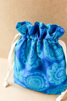 a blue bag sitting on top of a table