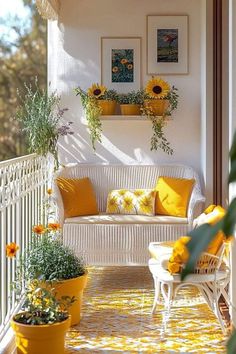 the sunflowers are growing on the balcony in front of the couch and chairs