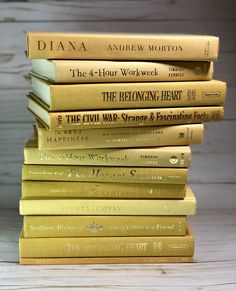 a stack of books sitting on top of each other