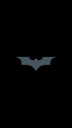 the dark knight rises batman logo on a black background, with only one bat visible