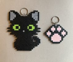 two keychains made out of plastic beads