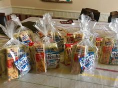 several bags of bread sitting on top of a table