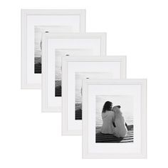 four white frames with black and white images on them