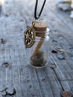 Corked glass bottle with labradorite chips and a scroll inside with a compass charm A Compass, Charm Necklaces, Glass Bottle, Compass, Glass Bottles, Labradorite, Charm Necklace, Cork, Necklace Etsy