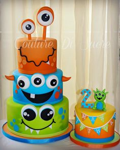 there are two cakes decorated to look like monsters