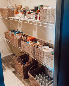 an organized pantry with baskets and food items