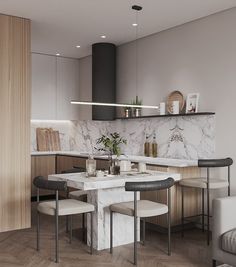 a kitchen with marble counter tops and white chairs around a dining table that is surrounded by wooden flooring