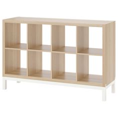 a wooden shelf with six compartments on each side