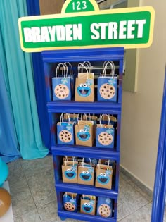 there is a blue shelf with bags on it and the sign says brayden street