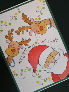 a christmas card with santa claus and reindeers