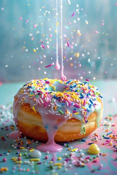 a donut with sprinkles falling from it