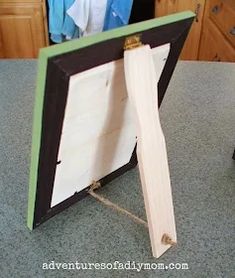 a wooden frame sitting on top of a counter