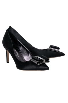 Step out in style with these Ferragamo pumps! In a sleek black satin material with a pointed toe and bow front, they'll pair perfectly with a fancy party dress. Your feet will be ready for any social season event! Size 8 Made in Italy Satin upper Leather lining and sole Black and gunmetal bow toe detail Pointed toe Minor blemishes on heel Heel height 3" Fitted Heels With Satin Bow And Round Toe, Fitted Satin Bow Heels With Round Toe, Chic Heels With Satin Bow For Formal Occasions, Chic Formal Heels With Satin Bow, Pointed Toe Heels With Bow For Night Out, Pointed Toe Heels With Bow For Gala, Gala Pointed Toe Heels With Bow, Satin Closed Toe Heels With Bow, Round Toe Heels With Satin Bow For Evening