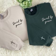 If you're looking for a shirt that's elegant, sophisticated and reflects your faith, check out our Grade Sweatshirt and Embroidered Faith Sweatshirt. The product is specially designed for those who want to express their faith. Grade Sweatshirt, Fair Sweatshirt is designed to stand out with intricate and meticulous cross-stitch embroidery on the sleeves, creating a delicate and meaningful highlight for those who want to express their faith. Every detail is carefully cared for, bringing grace and Christian Clothing Brand, Faith Sweatshirt, Jesus Clothes, Christian Shirts Designs, Friends Sweatshirt, Custom Cross, Hand Design, Christian Sweatshirt, Embroidered Tee