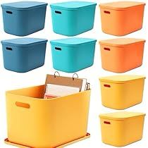 several different colors of plastic storage bins