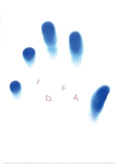 the word idea written in blue ink on a white background with small drops of water