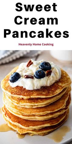 a stack of pancakes with blueberries and cream on top is featured in the book sweet cream pancakes heavenly home cooking