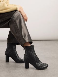 Bottega Veneta's 'Atomic' boots have been crafted in Italy from strips of supple leather using the label's signature intrecciato technique. They're set on cylindrical block heels and have gripped rubber soles. Bottega Veneta Shoes, Winter Work Wear, Raffia Bag, Shoes Boots Ankle, Boot Pumps, Fall Shopping, Ski Wear, Clothes Collection, Black Ankle Boots