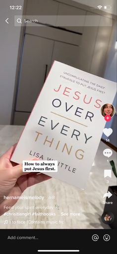 someone holding up a book about jesus over every thing in their life with the captioning below