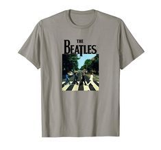 the beatles t - shirt with an image of people walking across a zebra crossing road