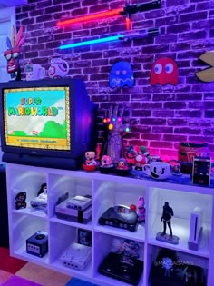an entertainment center with various video games on shelves and neon lights in the back ground