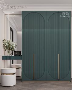 a green closet with two doors and some white stools in front of the door