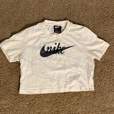 Nwot Nike Cropped Not See Through With Tan Or Gray Underneath Size: S Nike Basic Graphic Print Top, Nike Basic Top With Graphic Print, Basic White Nike Top, Nike Basic Tops With Letter Print, Basic Nike Tops With Letter Print, Nike Women Outfits, Cropped Nike, Cropped White Tee, Nike Style