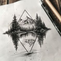 a pencil drawing of mountains and trees with a lake in the middle is on a piece of paper