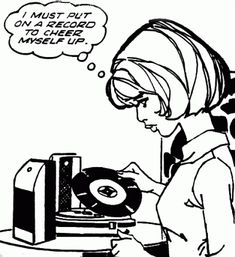 a woman is looking at a record player