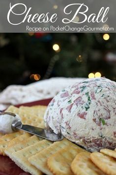 holiday cheese ball recipe on crackers with christmas tree in the background and text overlay