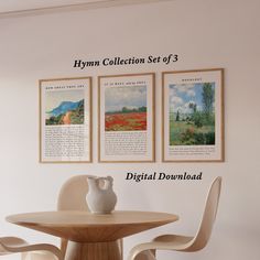 three framed paintings on the wall above a table with two chairs and a vase next to it