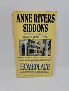 an old paperback book with the title homeplace written in blue and yellow on it