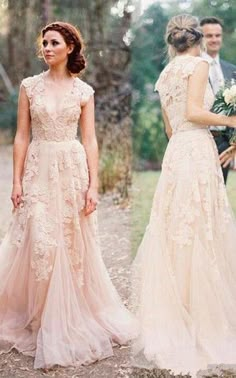 two women in wedding dresses standing next to each other