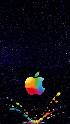 an apple logo is flying in the air with colored drops coming out of it's side