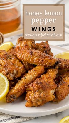 honey lemon pepper wings on a white plate