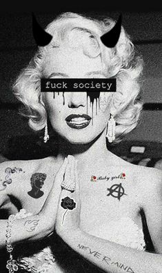 a woman with tattoos on her chest and the words f k society above her head