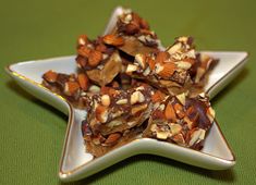 a star shaped plate filled with chocolate and nuts