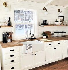 small white farmhouse kitchen Kitchen With Shiplap, Kitchen Cabinets And Countertops, Cottage Decor Farmhouse, Small Kitchen Remodel, Paint Kitchen, Kitchen Remodel Inspiration, Fireclay Sink, Interior Decorator, Kitchen Remodel Before And After