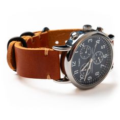 A comfortable leather band that is even more beautiful than the timepiece it's connected to.Our full-grain leather means your watch strap will develop character and patina. We hand-sew this strap with a thick Tiger Thread so it will never unravel or come apart. You can choose between sleek matte black or stylish polished nickel hardware. A removable sliding keeper keeps your strap firmly in place. We take a lot of pride in our work and back each strap with a lifetime guarantee.Fit and Sizing:Wit Timeless Leather Strap Watch Accessories For Everyday Use, Classic Leather Strap Watch Bands For Everyday Use, Vintage Leather Strap Watch For Everyday Use, Vintage Watch With Leather Strap For Everyday Use, Vintage Leather Watch Accessories For Everyday Use, Timeless Watch With Bracelet Strap For Everyday, Classic Leather Watch Bands With Stainless Steel Clasp, Brown Leather Strap For Round Dial Watches, Vintage Leather Strap Watch Bands For Everyday Use