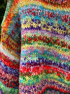 the colorful sweater is knitted with yarn