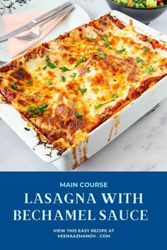 lasagna with bechamel sauce in a white casserole dish on a marble table