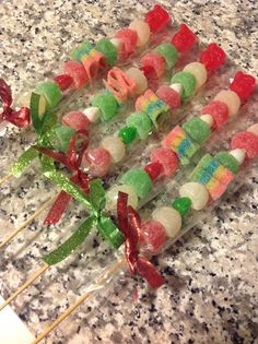 several candy lollipops are arranged on a table