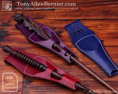 two different types of leather umbrellas on a wooden table