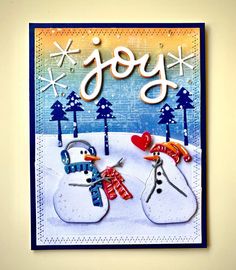 a christmas card with two snowmen and the word joy