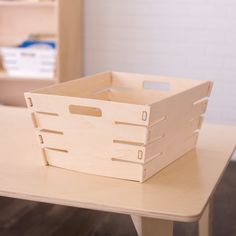 a wooden crate sitting on top of a table