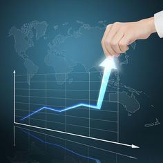 a hand is pointing at an upward graph on a dark blue background with a world map in the background